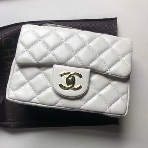 Mini white crossbody bag with gold hardware